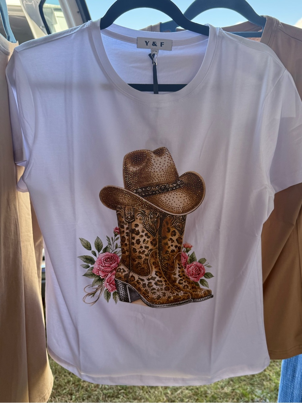 White Graphic Tee with Brown Cowboy Boots & Hat